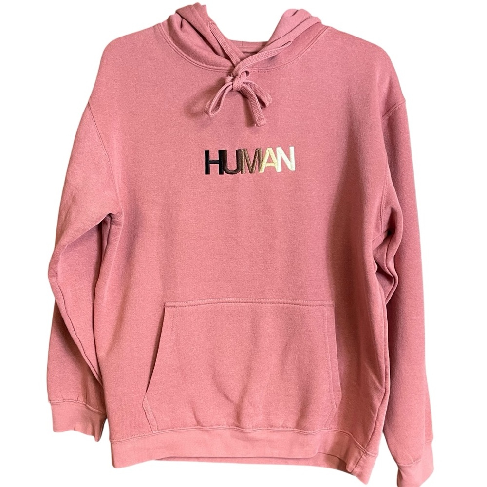 Wear the Peace pink hoodie with HUMAN embroidered on front, size medium